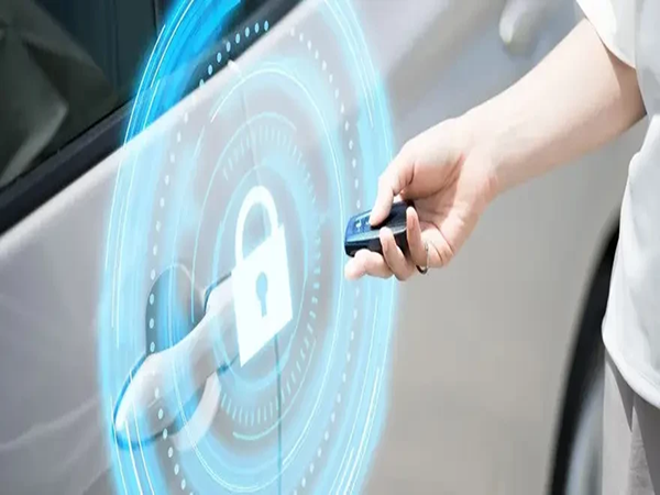 woman pointig to her car using transponder key